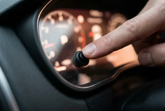Bouton de réinitialisation du compteur kilométrique sur voiture